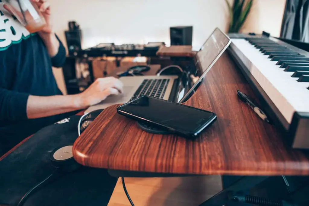 best apple laptop for music production - this music producer is using his macbook pro to power his entire studio