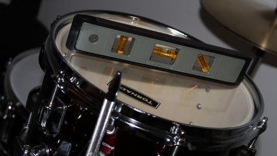 best acoustic drum kit for home recording - adjusting toms using bubble level